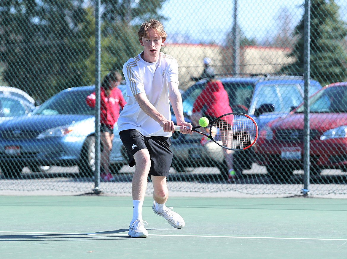 Charlie Johnson hits a backhand on Wednesday.