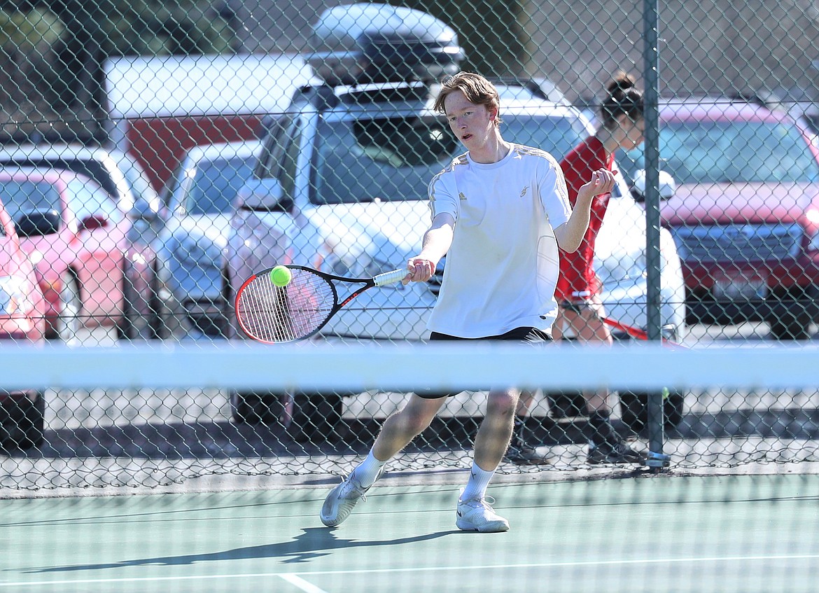 Charlie Johnson hits a forehand on Wednesday.