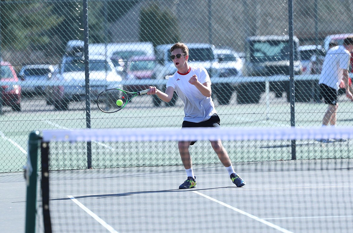 Christian Story hits a forehand on Wednesday.