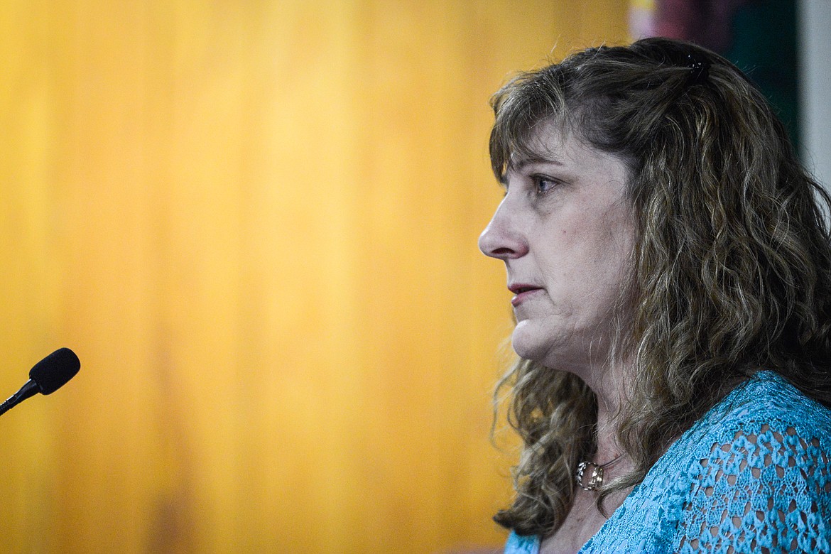 Leslie Hayden, daughter of Faye Shrode, reads a statement about her mother during a plea hearing for defendant Michael Hamilton at Kalispell Municipal Court on Friday. (Casey Kreider/Daily Inter Lake)