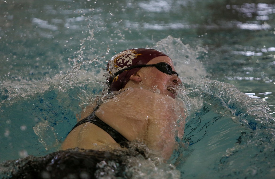 Moses Lake's Laurel Knox makes her way back down the pool at Moses Lake High School during the 500-yard freestyle event on Thursday afternoon.