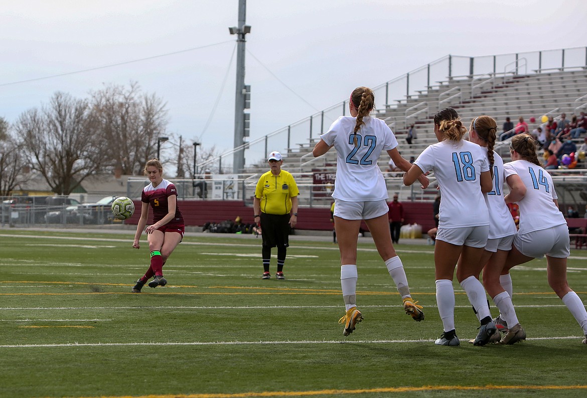 Senior Olivia Waites takes a free kick for Moses Lake on Saturday afternoon against Eastmont at Lions Field.