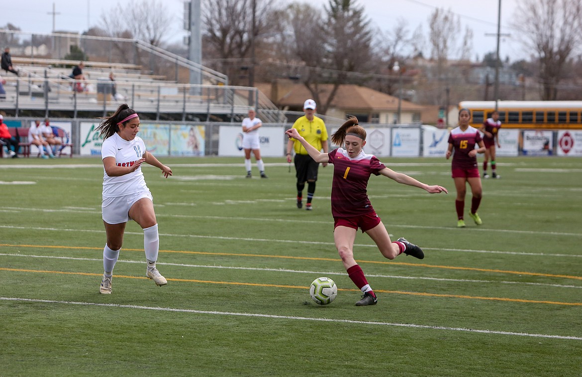 Kaydence Martinez fires in a goal in the first half to give Moses Lake an early lead against Eastmont in the season finale on Saturday at Lions Field.