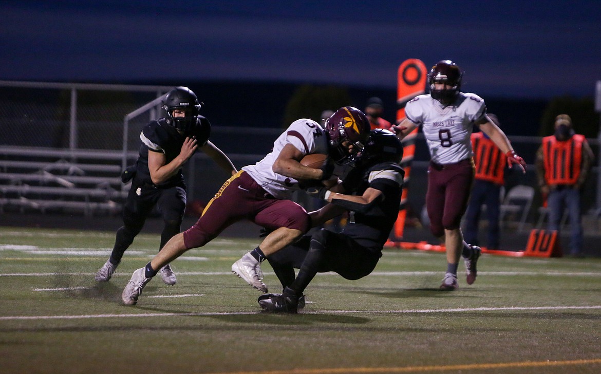 Moses Lake's Gerardo Nova powers his way in for a rushing touchdown late in the first half against Royal on Friday night in Royal City.