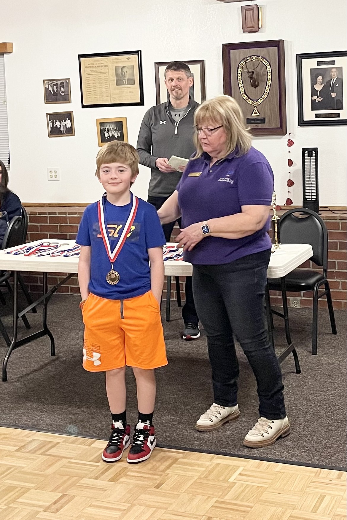 Courtesy photo
Wesley Trost won the boys 8-9 age division at the Coeur d'Alene Elks Hoop Shoot held Feb. 20 at The Courts at Real Life in Post Falls. Also pictured is Debbi Nadrchal, Elks Exalted Ruler, and Todd Stoddard, Hoop Shoot director.