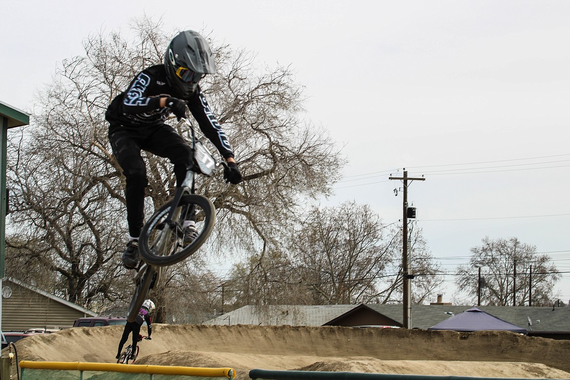 Newman Lake resident and expert rider Tarin Fields, age 13 and ranked 17th nationally, takes a test ride before Saturday’s race in Moses Lake.