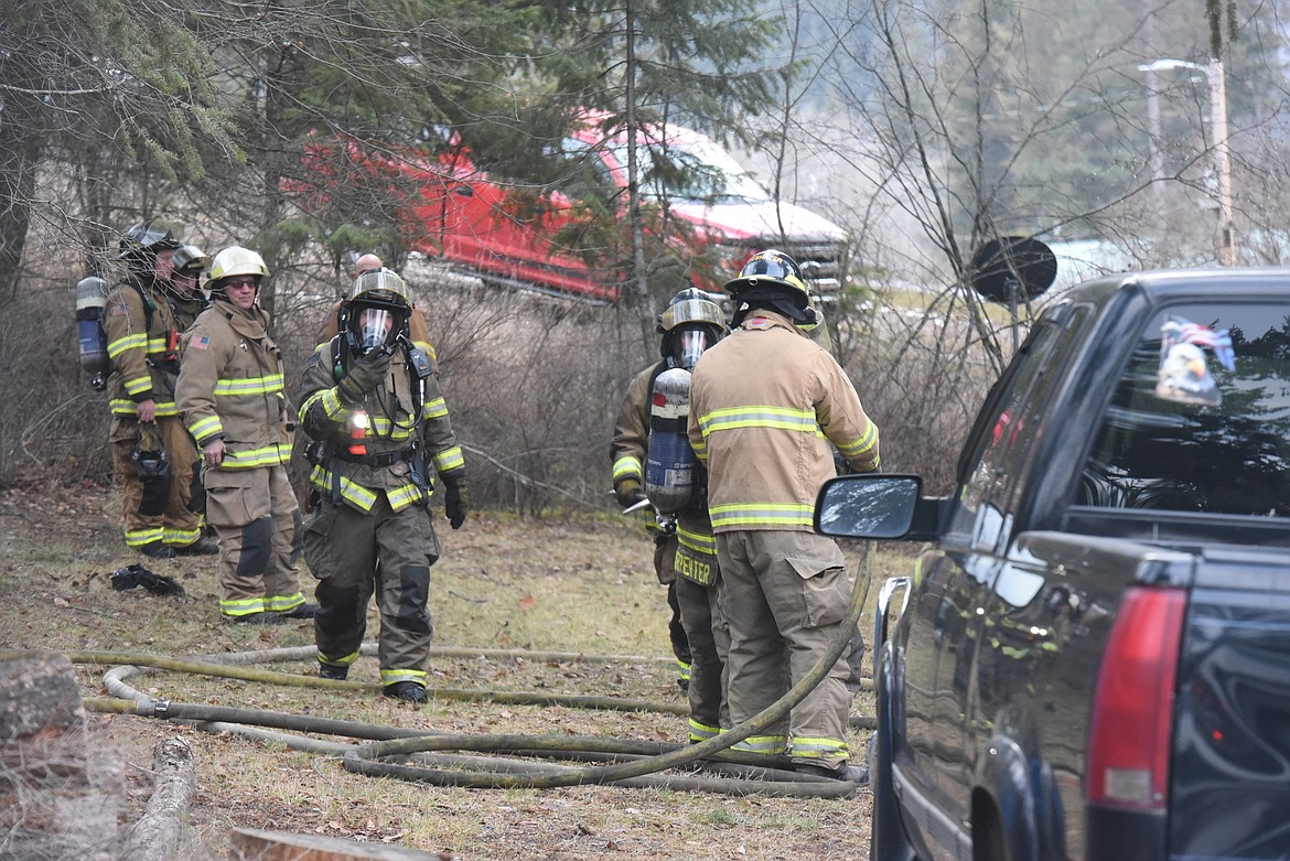 Steve Lauer, then assistant fire chief, oversees suppression efforts at a trailer fire Jan. 26. Firefighters with the Libby Volunteer Fire Department elected Lauer fire chief April 1. (Will Langhorne/The Western News)