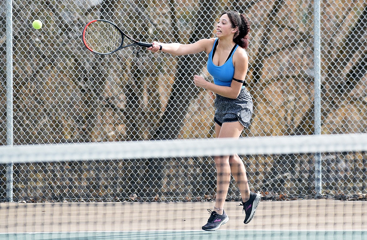 Whitefish junior Emma Trieweiler hits a shot during the high school girls tennis practice on Thursday. (Whitney England/Whitefish Pilot)