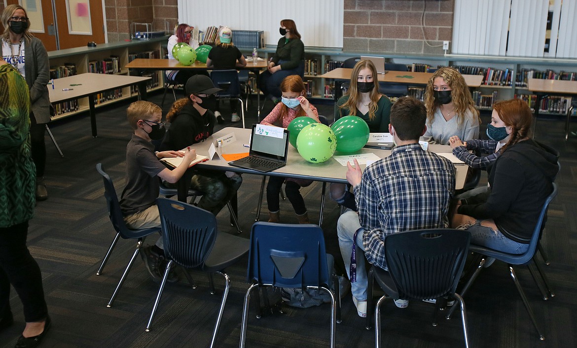 Students wear face masks during the first in-person meeting of the Student Advisory Group in March. Masks were a hot topic Monday during the Coeur d'Alene School Board meeting.