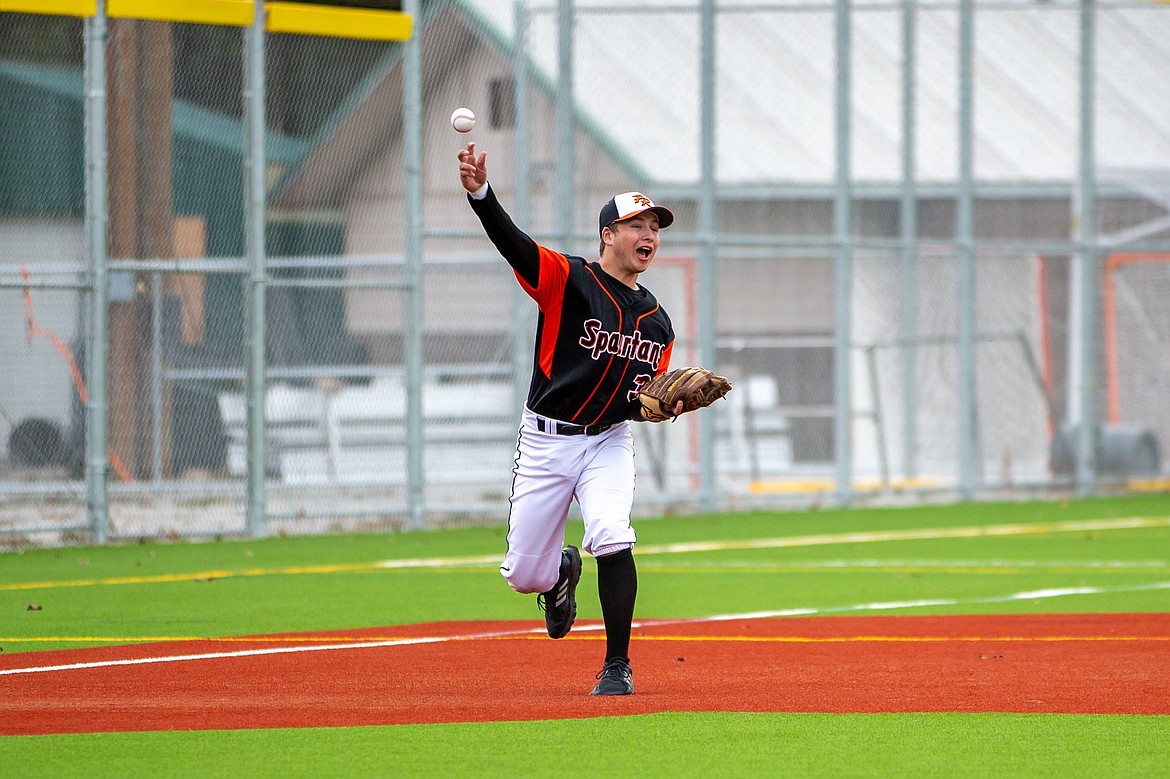 Coby Rogers makes a throw from third base last Thursday.