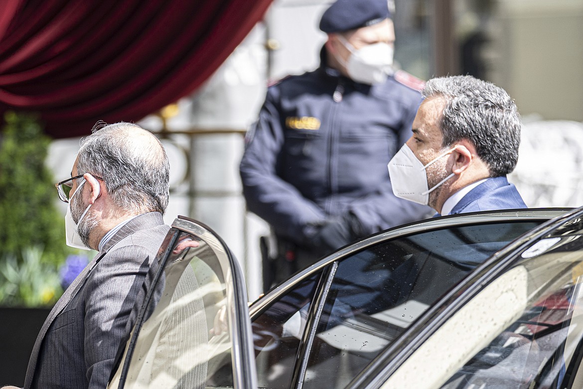 Political deputy at the Ministry of Foreign Affairs of Iran, Abbas Araghchi, right, arrives at the Grand Hotel Wien where closed-door nuclear talks with Iran take place in Vienna, Austria, Tuesday, April 6, 2021. Foreign ministry officials from the countries still in the accord, the so-called Joint Comprehensive Plan of Action, are meeting in Vienna to push forward efforts to bring the United States back into the 2015 deal on Iran's nuclear program.