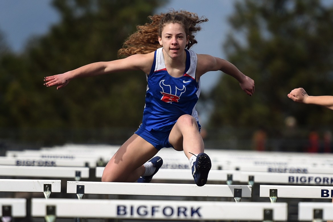 A Valkyrie athlete races over the hurdles during last Saturday's home track meet.
Jeremy Weber/Bigfork Eagle