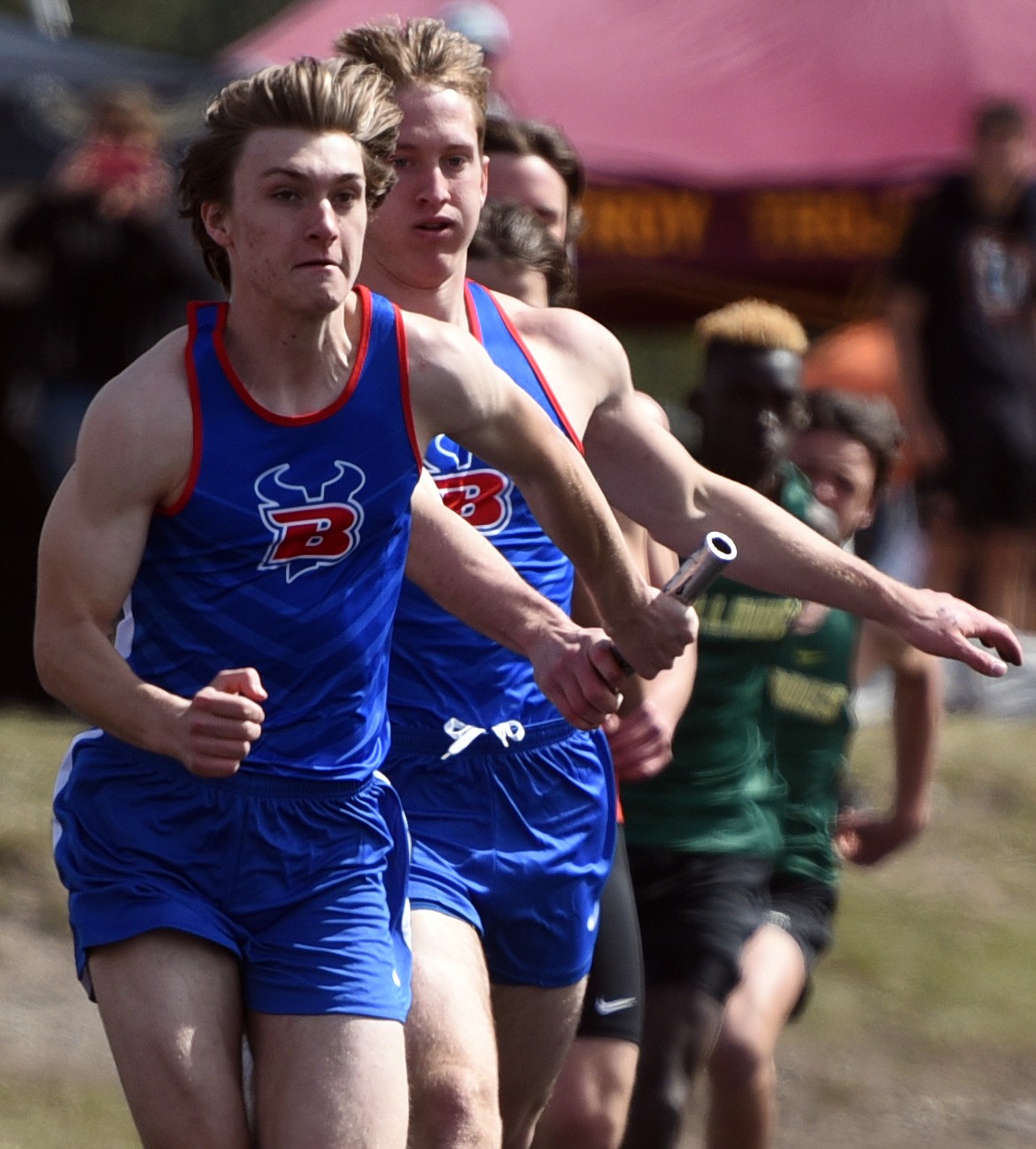 Relay runners race around the track at Bigfork High School.
Jeremy Weber/Bigfork Eagle