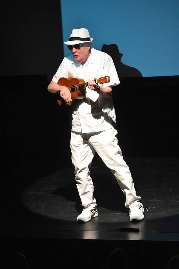 Gil Couts sings while playing the ukulele. 
Courtesy Cathy Hay