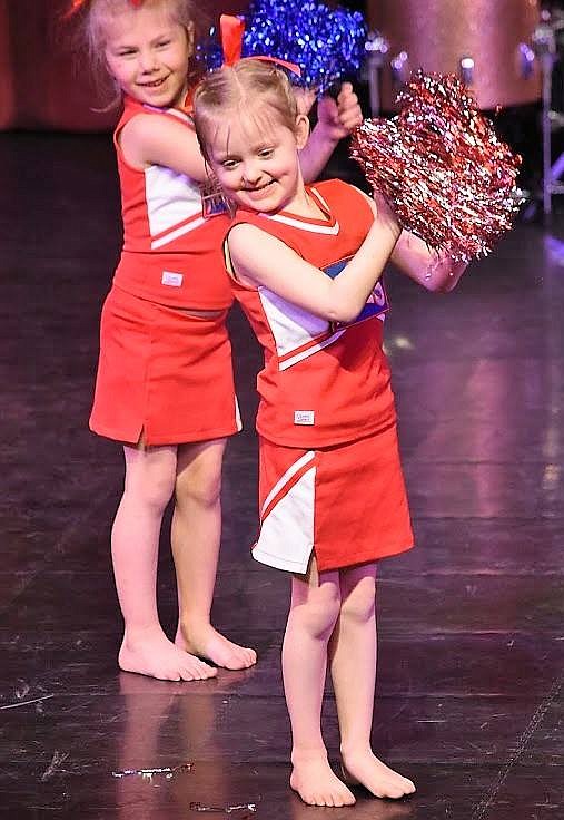 The ACES After-School Program cheer squad lights up the stage with a group routine.
Courtesy Cathy Hay