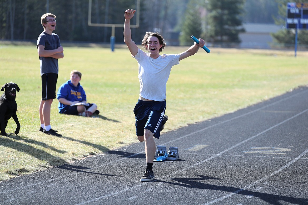 Joe Bopp celebrates after beating Wyatt Mintken in a race at practice last Friday.