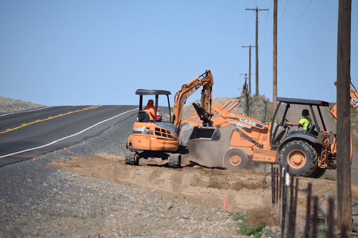 Construction workers at the Port of Moses Lake's new West Side Industrial Park move dirt for Renton-based Stoke Space Technologies, which has announced it is building a rocket engine testing center on 2.3 acres leased from the port.