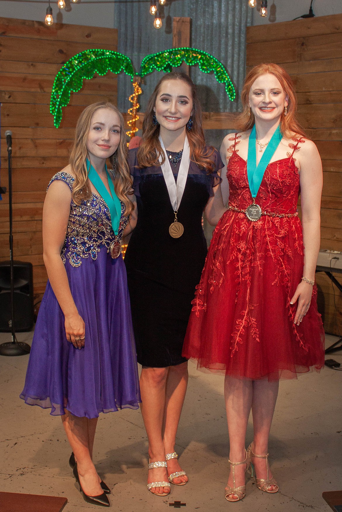 (From left) Moses Lake Distinguished Young Women program first runner-up Rebecca Shaporda, winner Esther Roeber and second runner-up Laurel Knox.