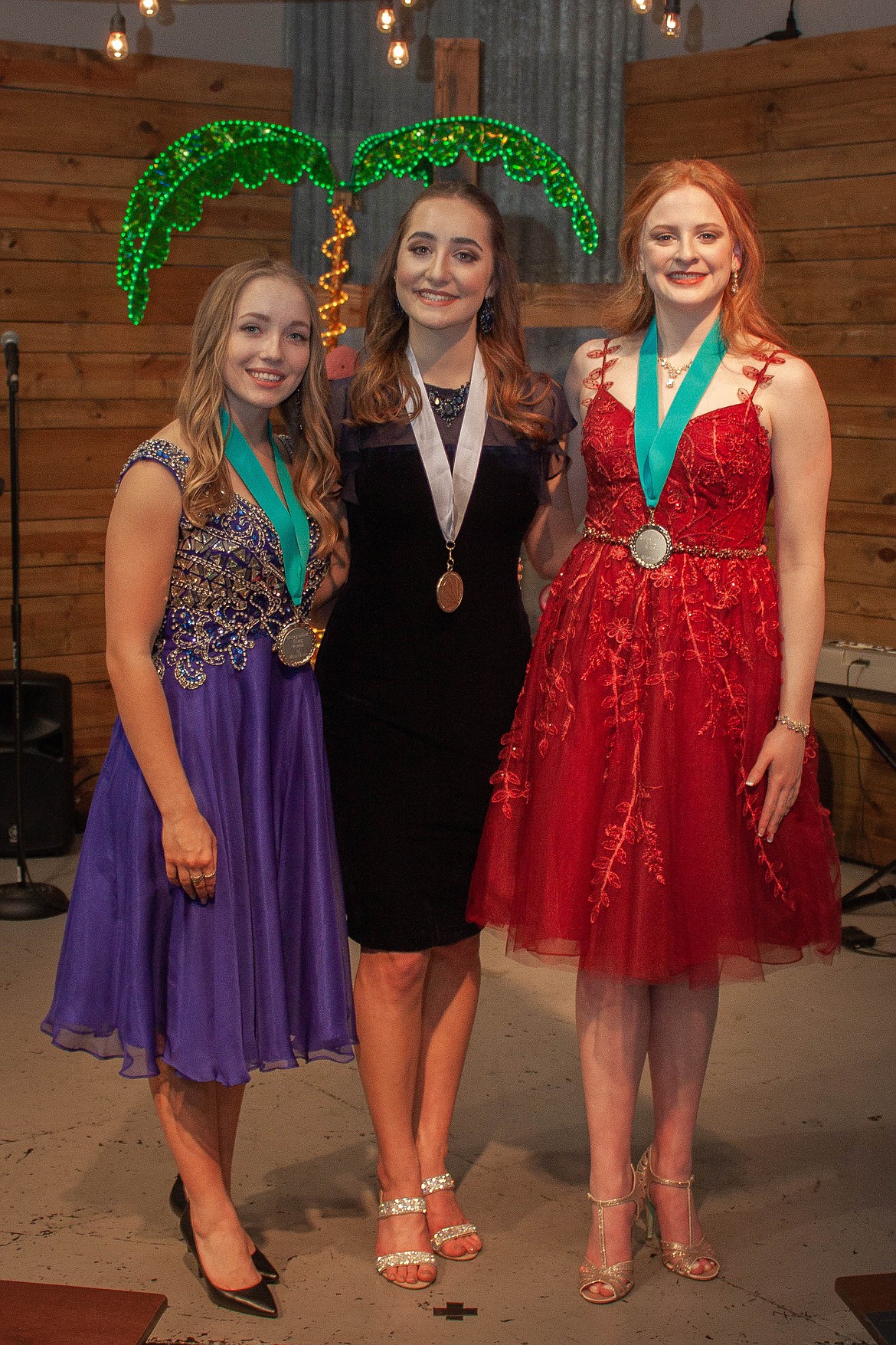 (From left) Moses Lake Distinguished Young Women program first runner-up Rebecca Shaporda, winner Esther Roeber and second runner-up Laurel Knox.