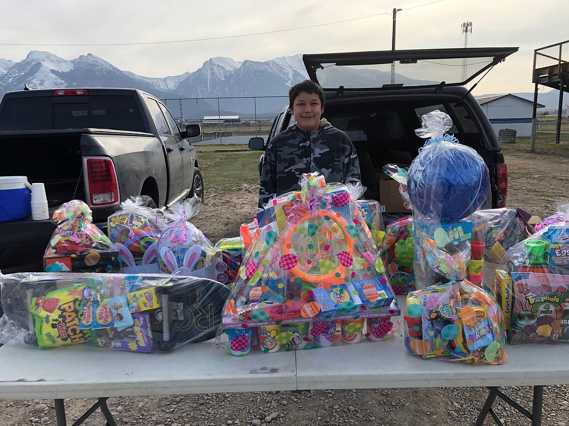 Sage Assiniboin, 12, has helped his family make the prize baskets for the St. Ignatius Easter Egg Hunt for the last eight years. (Courtesy of Irene Pritzak)