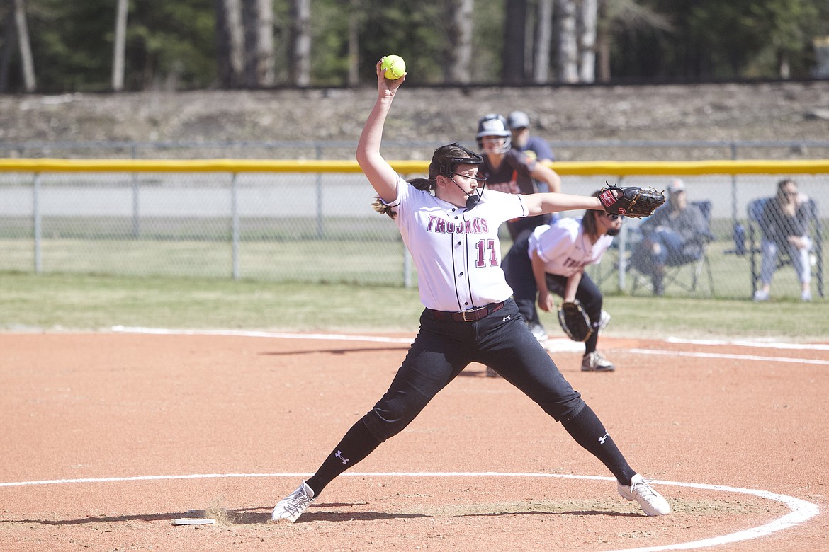 Paige Burger winds up for a pitch during the Lady Trojans April 6 game against Eureka. (Will Langhorne/The Western News)
