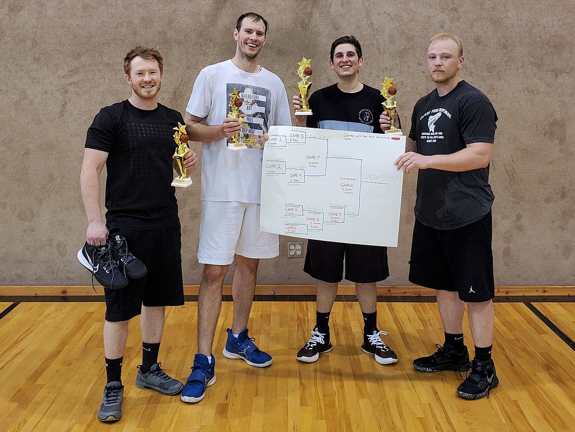The Snow Storm team consisting of Bradley Macumber, Kyle McMaster, Jordon Aguirre and Matt Smith claimed the adult championship at the first Filling Station Youth Center 3-on-3 basketball tournament on March 19-21.