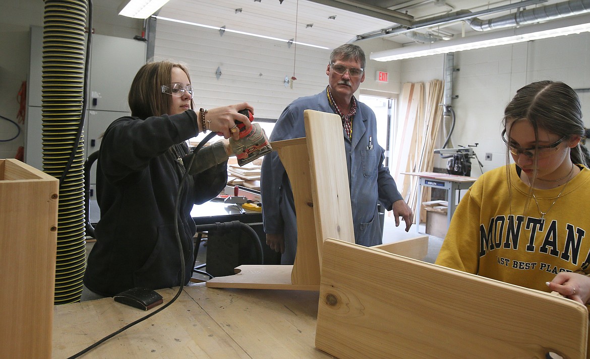 Seventh-grader Maddison Goodin works on a bench in Michael Noyes' shop class Wednesday at River City Middle School. Another levy attempt to support Post Falls schools is set for May 18.