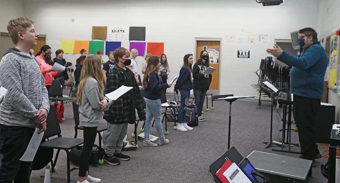 Music teacher Tyler Renninger teaches students the "Do Re Mi" scale in class at River City Middle School on Wednesday. Music programming is supported by funds from the district's supplemental levy. The election for the levy is May 18.