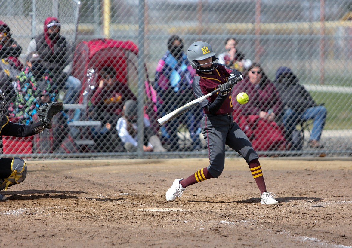 Annalyse Hernandez gets a hit from the plate for Moses Lake on Saturday afternoon at the softball jamboree at Moses Lake High School.