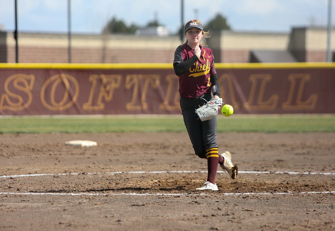 Moses Lake's Morgan Ross pitches for the Chiefs in the first game of the afternoon against Othello High School at the softball jamboree in Moses Lake on Saturday.