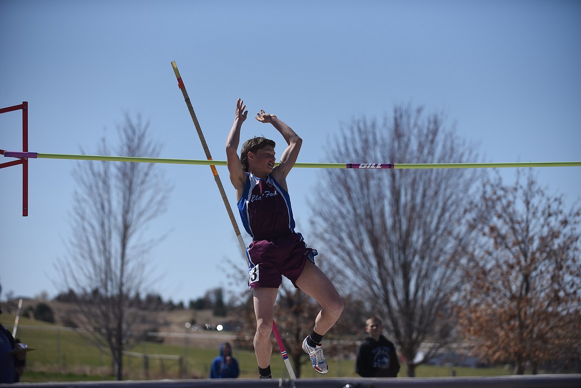 Clark Fork’s Alan Ryan clears the bar in the pole vault during the Dave Tripp Memorial track and field meet at Polson High School Friday. (Scott Shindledecker/Valley Press)