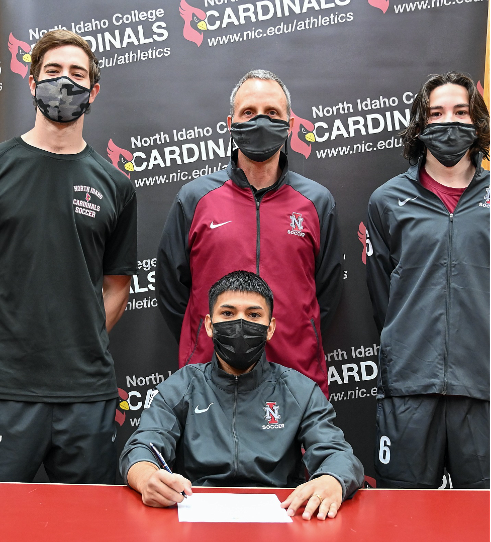 Photo courtesy NORTH IDAHO COLLEGE
North Idaho College sophomore Jairo Aguirre recently signed a letter of intent to play soccer at NAIA Corban University in Salem, Ore. Seated is Jairo Aguirre. Standing, from left, is Max Warnell, NIC men's soccer coach Ken Thompson and Andrew Abalan.