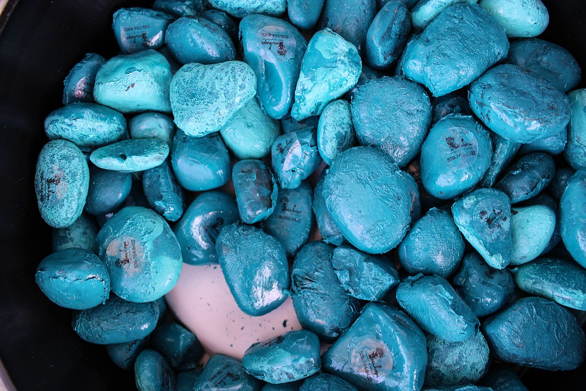 A blue rock basket, put out by New Hope at 311 West Third Ave., to raise awareness for sexual assault in the community.