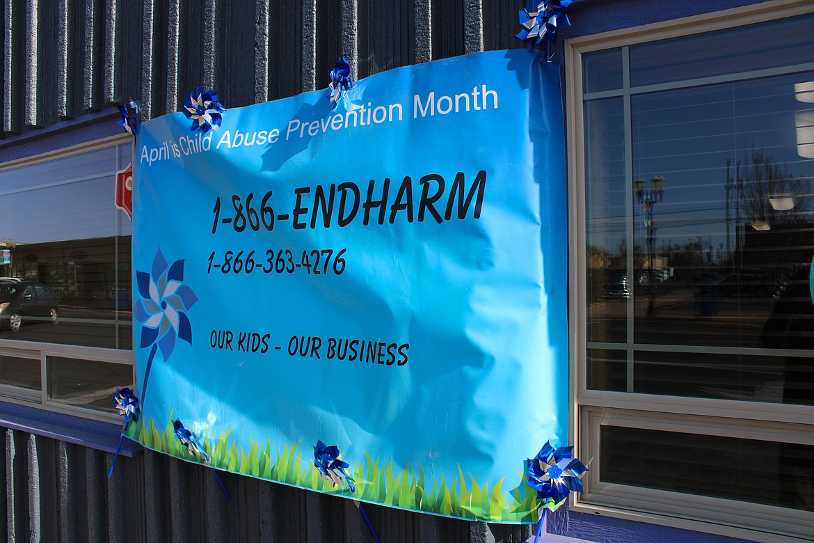 A Child Abuse Prevention Month poster in front of Kids Hope at 311 West Third Ave. in Moses Lake.