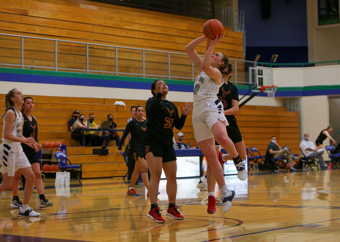 Big Bend Community College's Kelsey Sorenson goes up for a shot in the paint against Yakima Valley Community College on Wednesday, April 7.