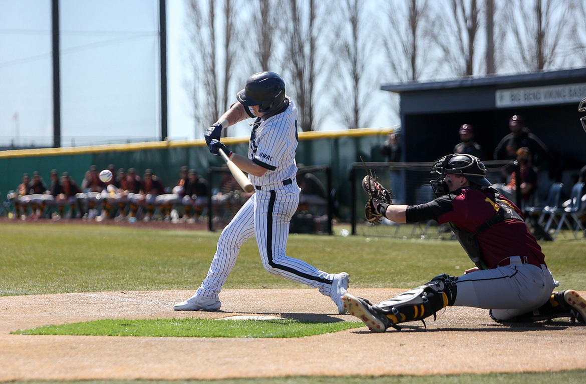 Big Bend's Eric Mast takes a swing at home plate against Yakima Valley on Sunday afternoon at Big Bend Community College.