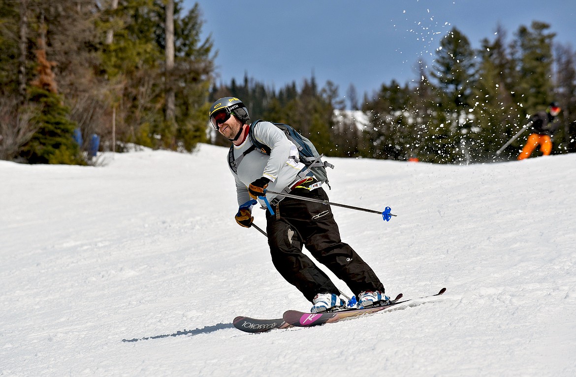 A skier enjoys a warm spring day in April at Whitefish Mountain Resort. (Whitney England/Whitefish Pilot)