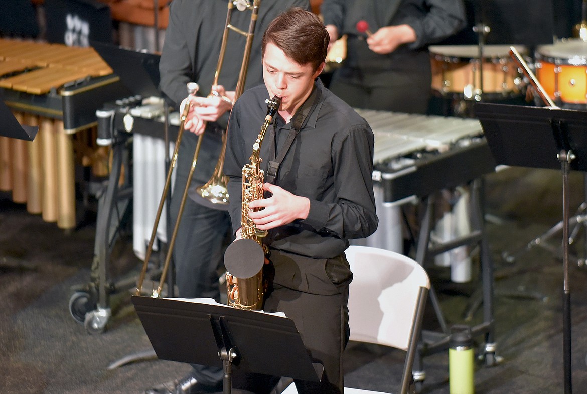 Whitefish sophomore Henry Seigmund plays the alto saxophone during a Jazz Band concert on Thursday at WHS. (Whitney England/Whitefish Pilot)