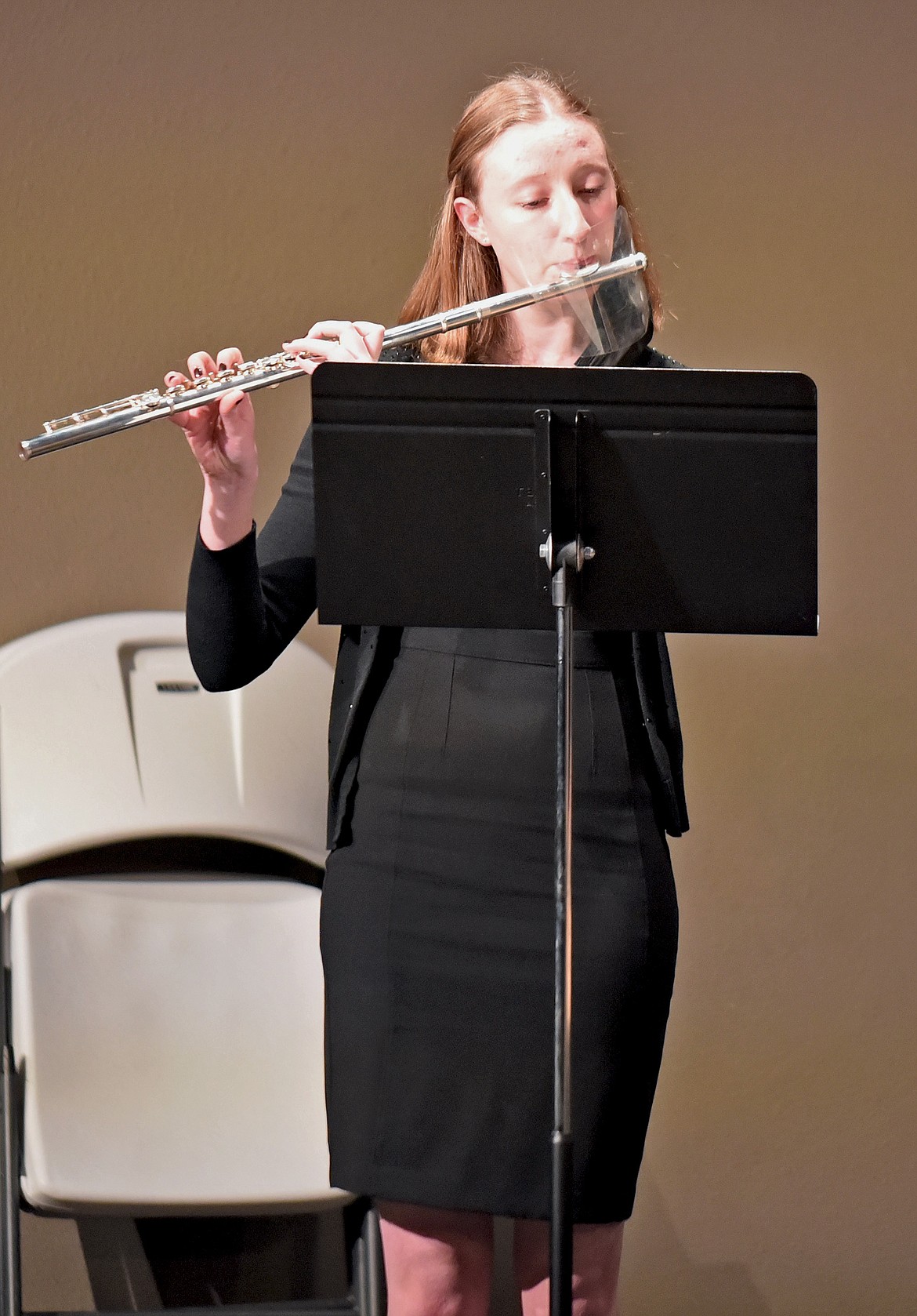 Whitefish senior flutist Abigail Bowden is featured during a number at the high school’s live jazz band performance on Thursday. (Whitney England/Whitefish Pilot)