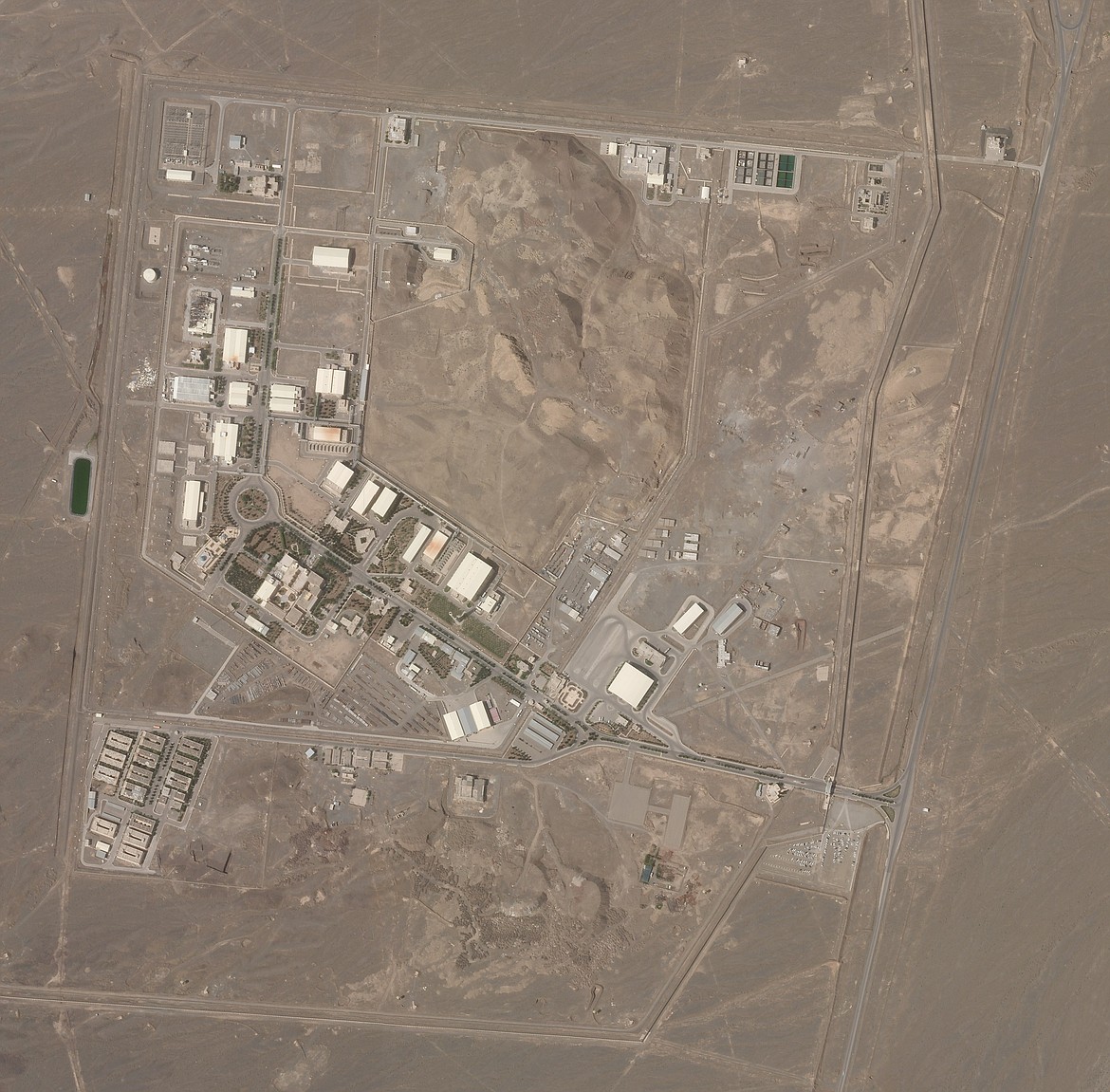 This satellite photo from Planet Labs Inc. shows Iran's Natanz nuclear facility on Wednesday, April 7, 2021. Iran's Natanz nuclear site suffered a problem Sunday, April 11, involving its electrical distribution grid just hours after starting up new advanced centrifuges that more quickly enrich uranium, state TV reported. It was the latest incident to strike one of Tehran's most-secured sites amid negotiations over the tattered atomic accord with world powers.