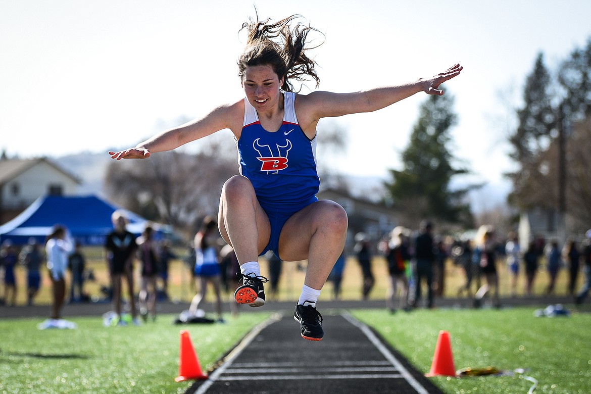 Bigfork's Olivia Pendlay competes in the triple jump during a track and field meet with Flathead and Whitefish high schools at Legends Stadium on Tuesday. (Casey Kreider/Daily Inter Lake)