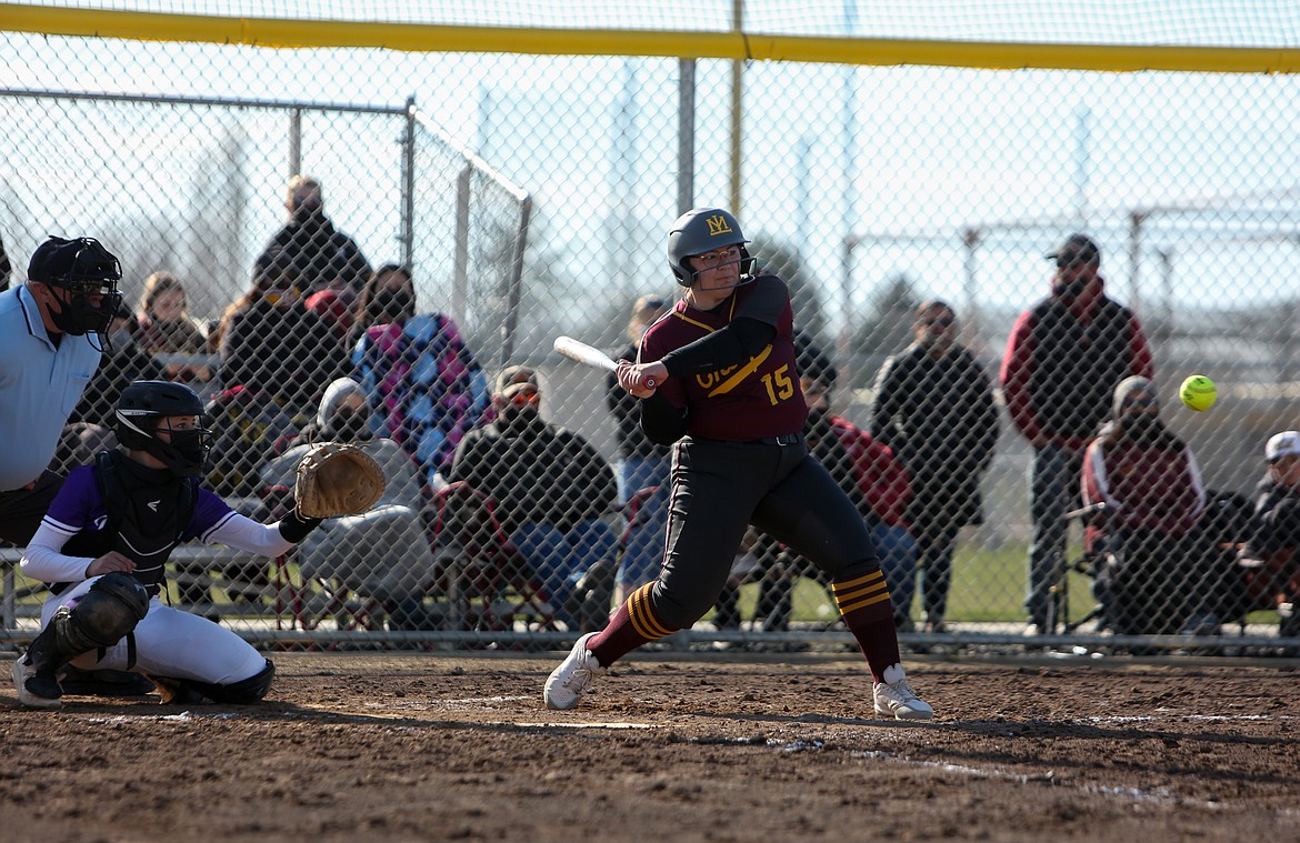 Laurissa Martinez watches in the pitch from home plate on her way to a 3-4 day hitting against Wenatchee on Tuesday, finishing with a team-high four RBIs.