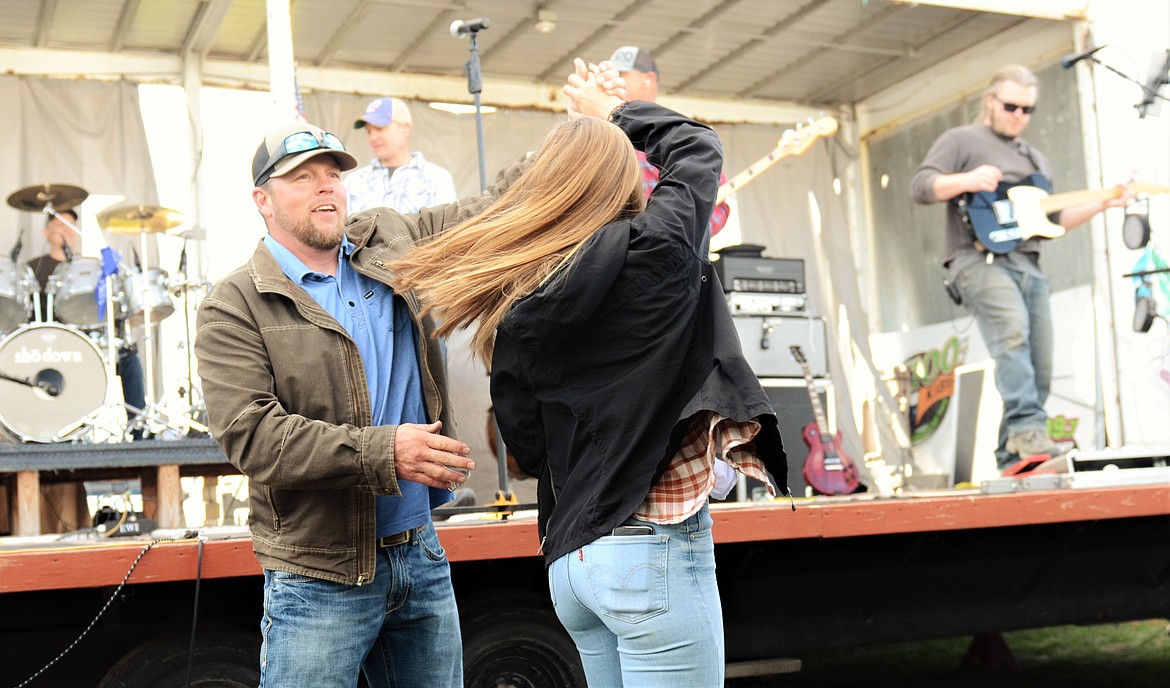 People were supporting a good cause and having a great time dancing to the hard-hitting sounds of Showdown at the Isaiah Allik fundraising picnic at Leon Hall on Sunday. (Carolyn Hidy/Lake County Leader)