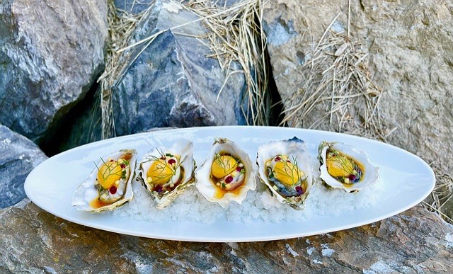 Oysters on the half shell with a soy, sake and mirin dressing. 
Courtesy photo