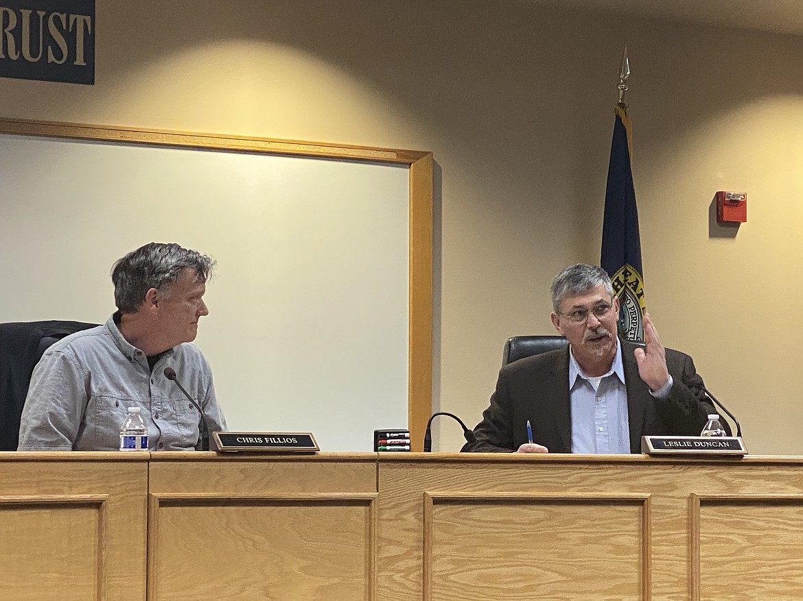 Marc Eberlein, the ad hoc representative of Commissioner Leslie Duncan, stepped down from the ad hoc committee Tuesday night in opposition to the study process. From left: Dan Gookin, Marc Eberlein. (MADISON HARDY/Press)