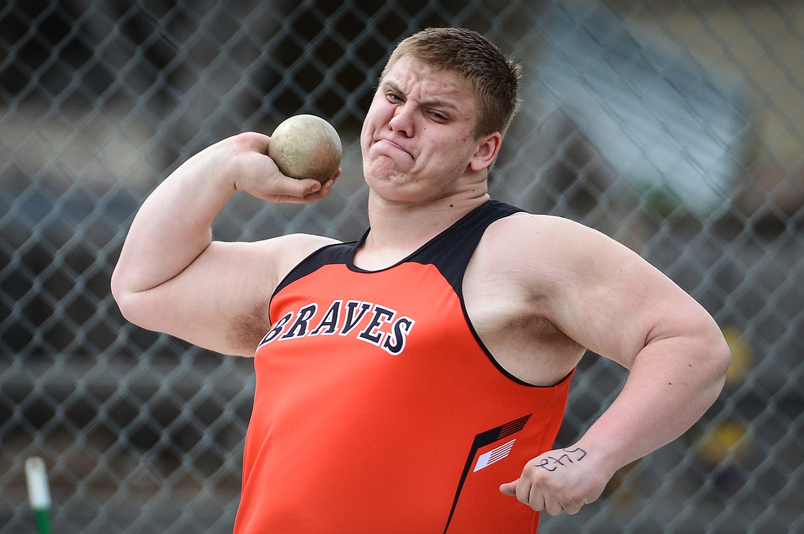 Flathead's Logan Lang competes in the shot put during a track and field meet at Legends Stadium on Tuesday. (Casey Kreider/Daily Inter Lake)