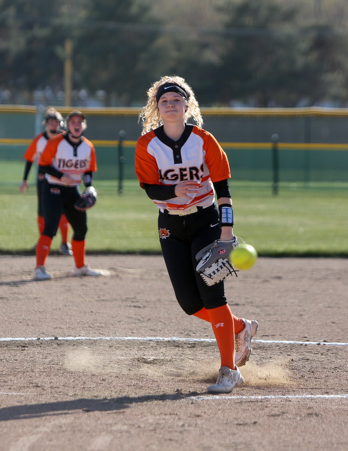 Ephrata senior pitcher Rylee Peters warms up between innings on her way to her first win of the season against Eastmont High School on Wednesday.