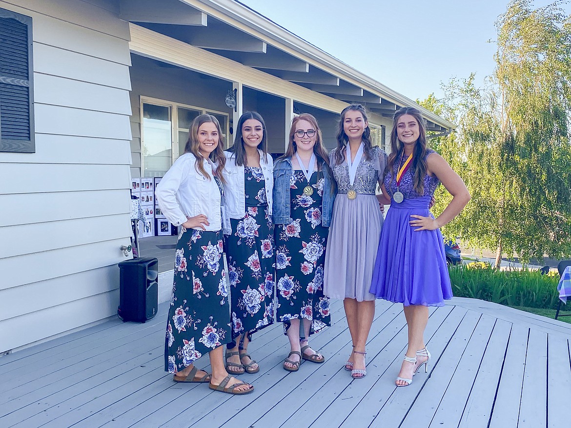 From left) 2020 Distinguished Young Women program participants Joy Bruneel, Riley Earl, 2019 DYW winner Ellie Knox, 2020 DYW winner Lauren Tolley and 2020 first runner-up Lacey Moser.