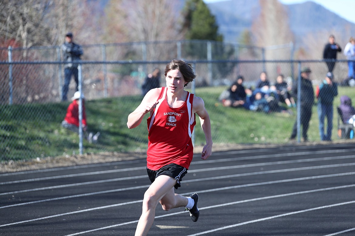 Ryder Haynes runs in the 400.