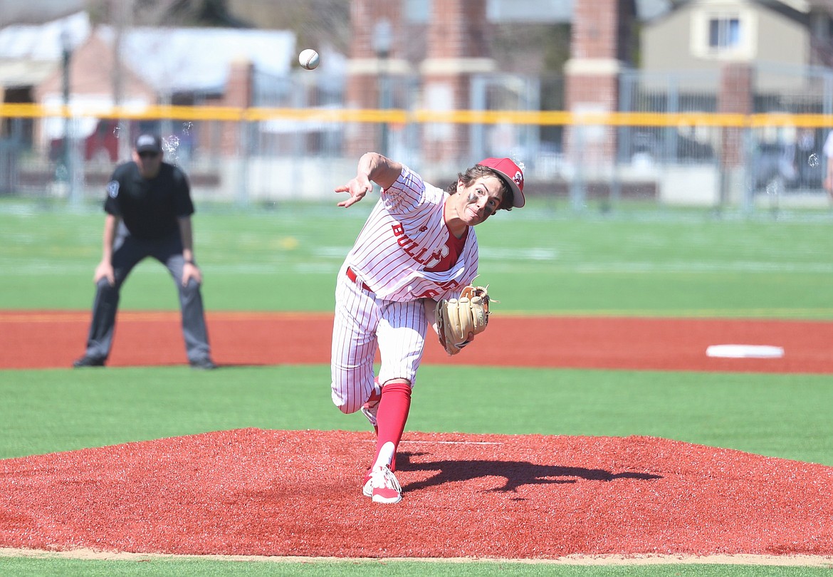 Junior Auggie Lehman pitches on Saturday.